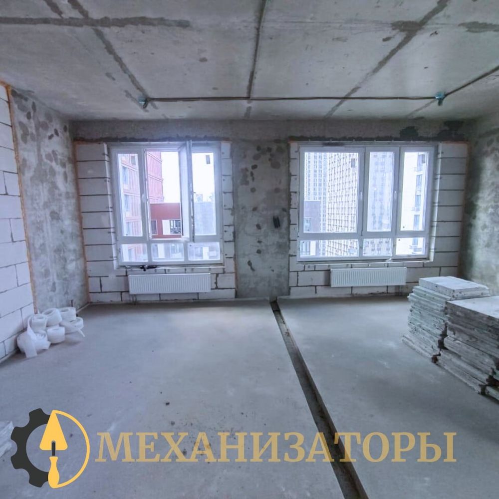 Штукатурка стен в комнате с двумя окнами